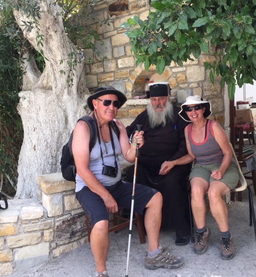 The Priest who kindly offered us biscuits and Raki on our trip down the gorge. He put his hat on for the photo.